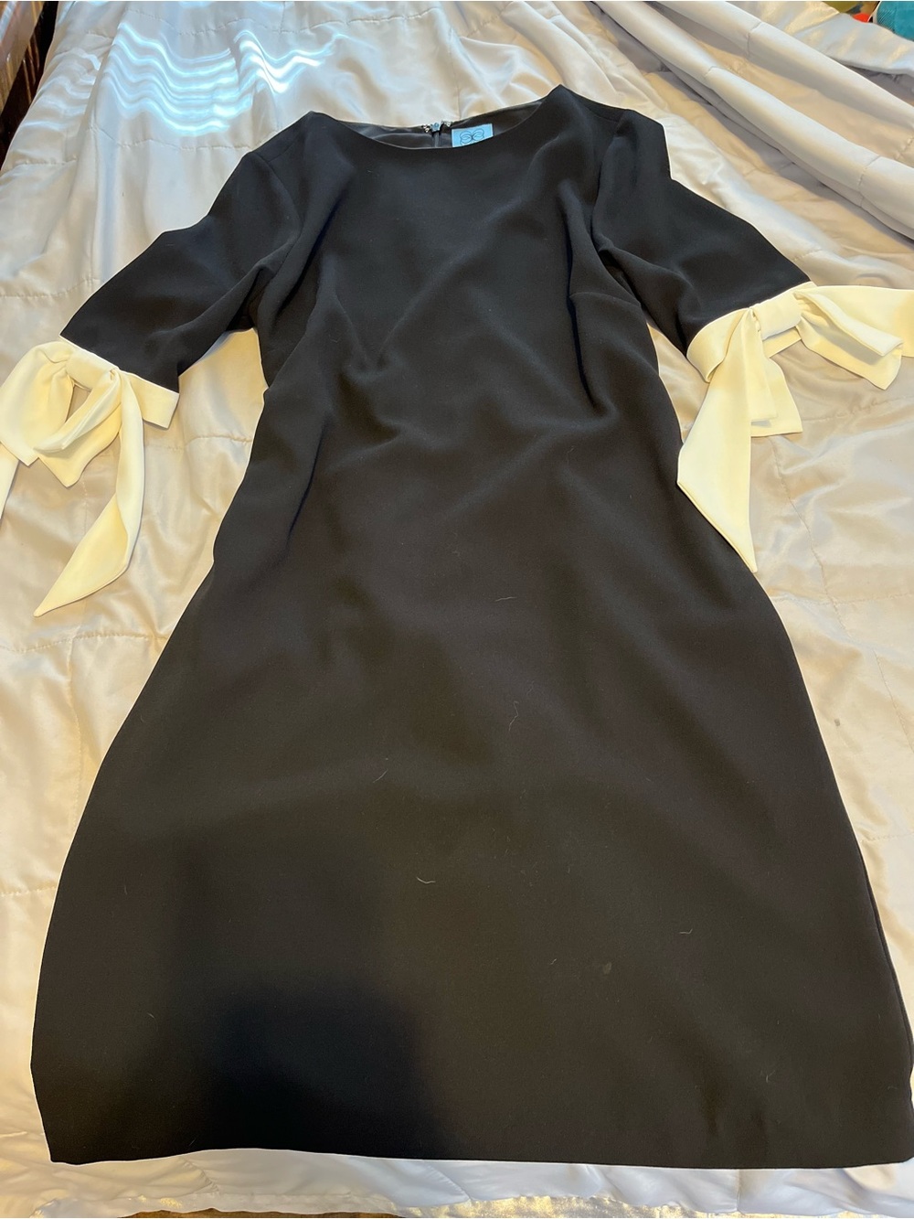 CeCe Black mini Dress with Cream Bow Sleeve Detail